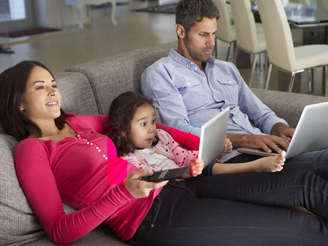 Man Woman Child On Couch With Laptops1